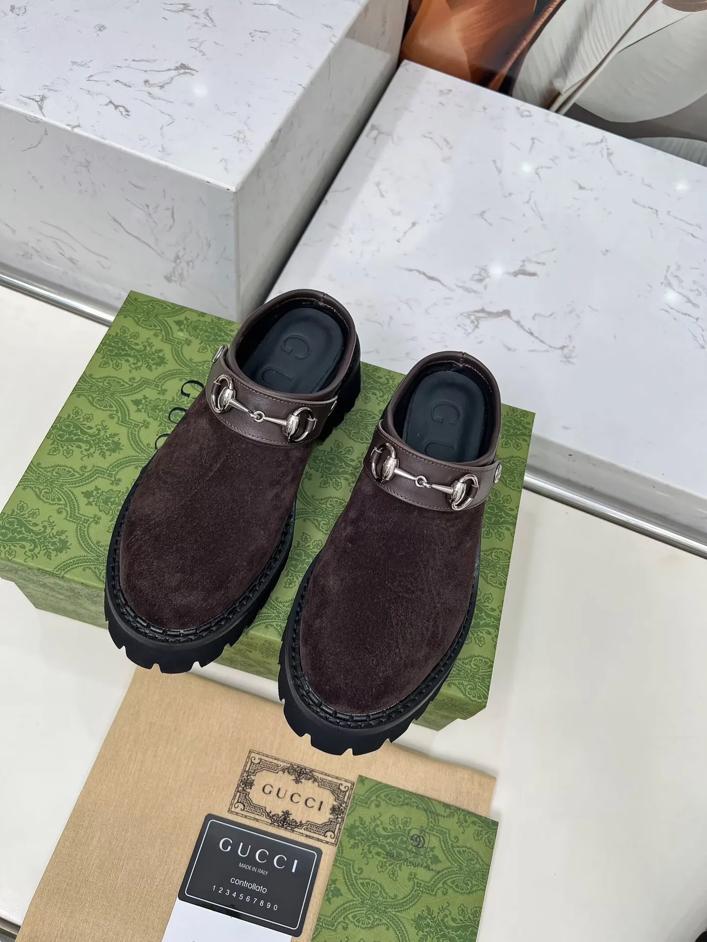 👟👟Ex-factory price 480👟👟 GUCCI British-style fashion slippers, lazy design back stumbling ➕thick sole increased height, empty back shape looming with exposed ankles, super cool when walking, age-neutral style, wide audience, Fabric: cowhide, mercerized cow suede Lining/foot pad: cowhide Outsole: foam outsole Heel height: 5cm Number of yards: 35-42 (customized numbers at both ends) Color: 4 colors available: black, brown, and military green Packing: card, bag